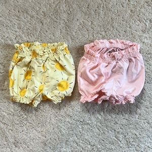 2 Baby Gap stretchy shorts, pink and sun print. Size 3-6M